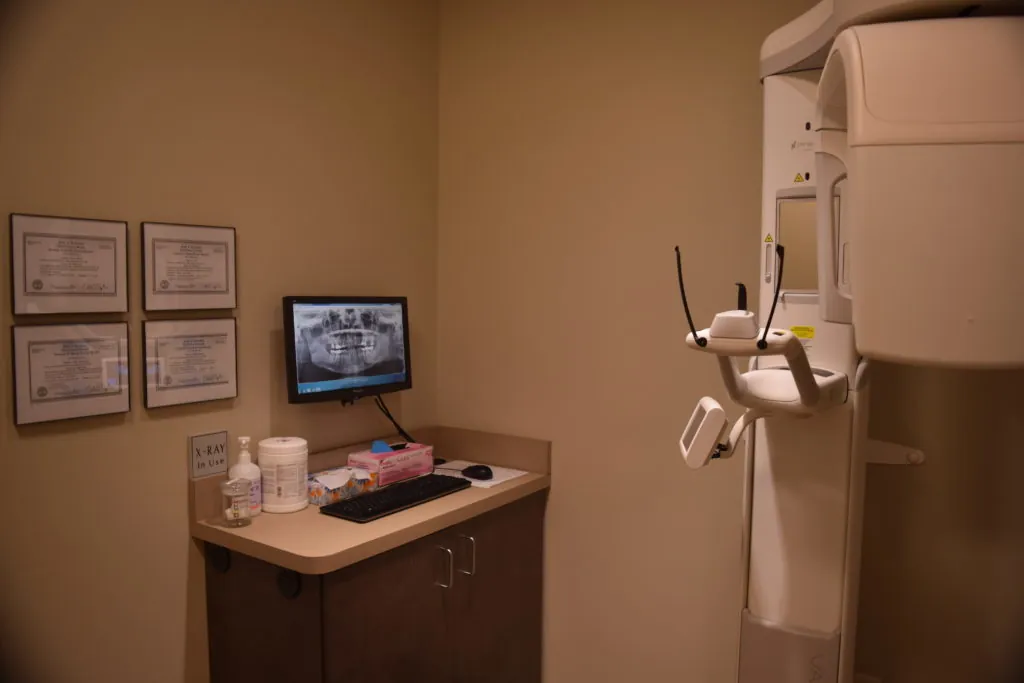 Image of room where patients receive x-rays to add in diagnosis and treatment which are part of the comprehensive general dentistry services.