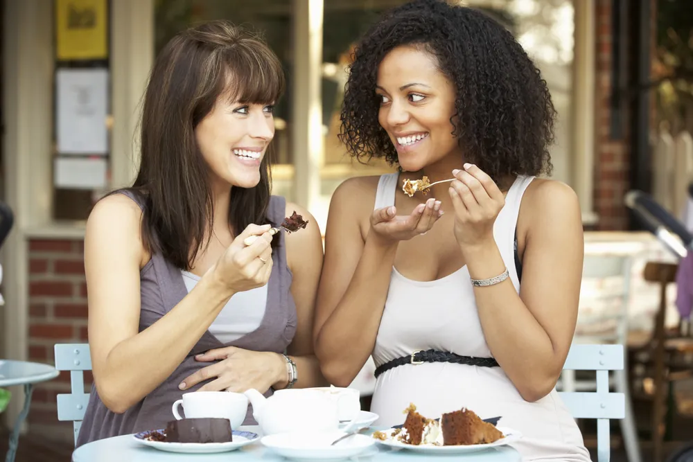 Two friends enjoy desert at Stock and Barrel in Knoxville TN.