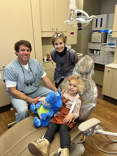 Dr. Kelso and Jan with child patient at Robert M. Kelso DDS